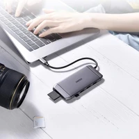 Choetech 9in1 daugiafunkcinis USB Type C šakotuvas - 3x USB 3.2 Gen 1 / SD ir TF atminties kortelių skaitytuvas / HDMI 4K 30Hz / VGA Full HD 60Hz / USB Type C / RJ45 pilkas (HUB-M15 pilkas)