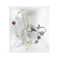 SHELLS telefono dirželis, pakabukas / virvelės ilgis 44 cm (22 cm kilpoje) / ant rankos – baltas ir violetinis