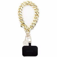 Guess GUOUCBMC4MD Universal Big HandStrap auksinis/auksinis 4G Charm