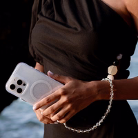 UNIQ Coehl Candy Gem Handstrap universalus telefono rankinis dirželis sidabrinis/sidabrinis sparkling